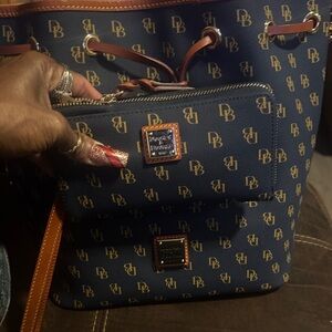 Dooney & Bourke Blue and Tan Logo Backpack